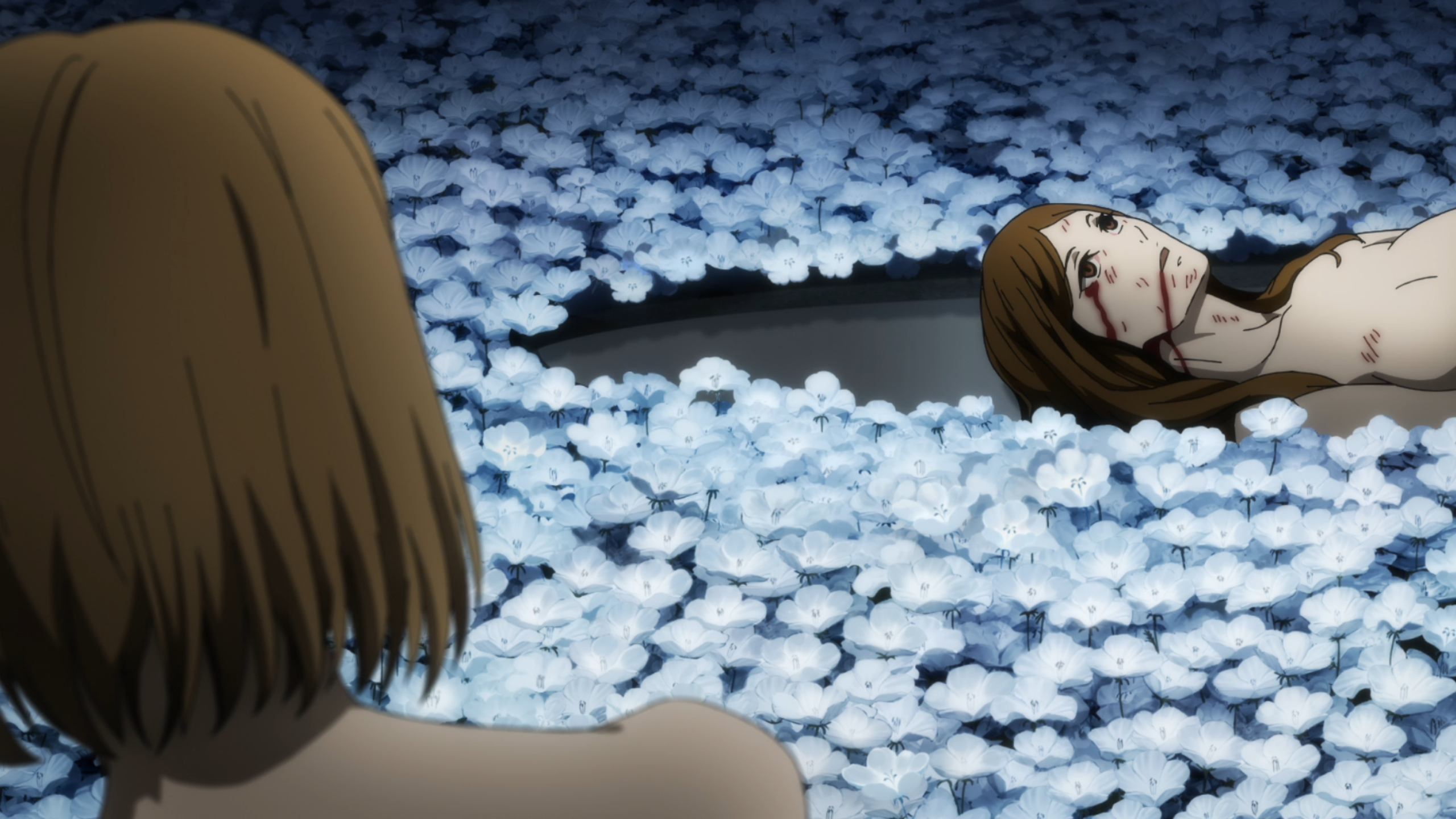 Naked human body in a field of white flower petals